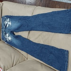 NWT Denim couture jeans with cross design size 3
